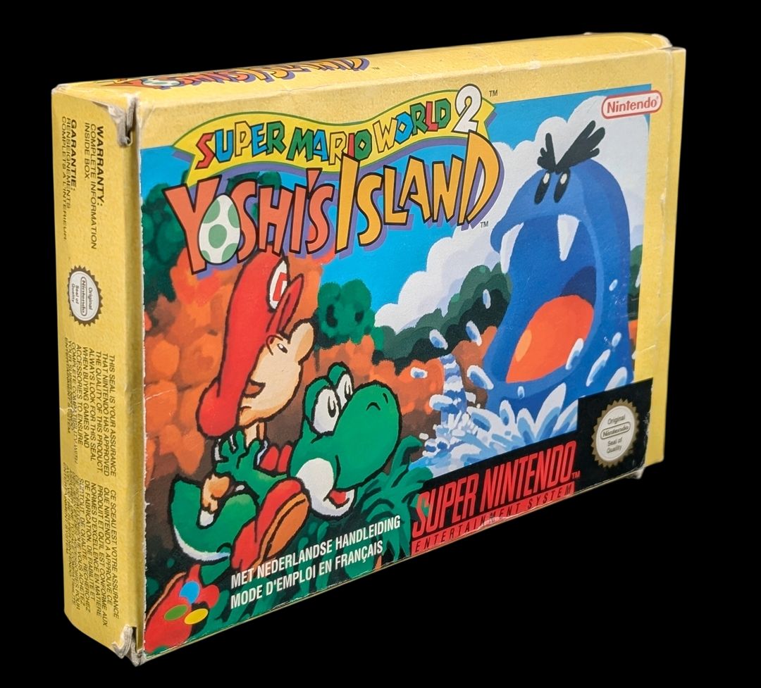 Nintendo - Super NES - Jeu : Super Mario World 2 : Yoshi's Island. Avec boîte, cartouche, notice, cale en carton. Version du jeu FAH.