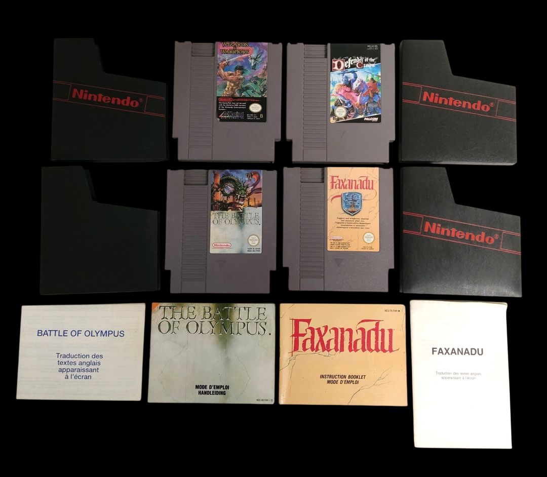 Nintendo – NES – Lot de 4 jeux : Wizards & Warriors, Defender of the crown, Faxanadu, The battle of Olympus. Avec fourreaux, 2 notices. Version des jeux FAH.