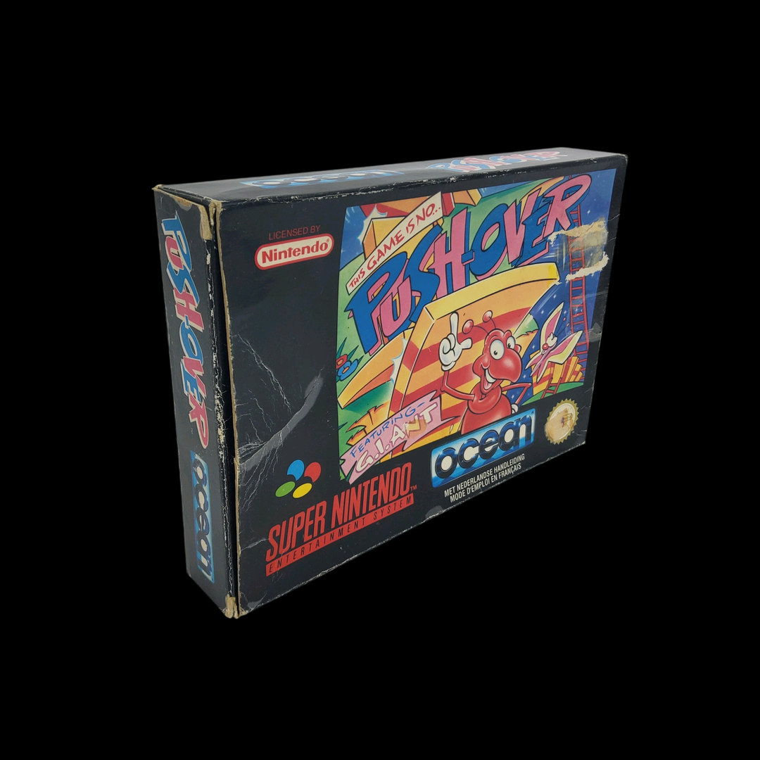 Nintendo – Super Nes – Jeu : The Game is no Push-Over. Avec cale en carton, boîte, notice.
