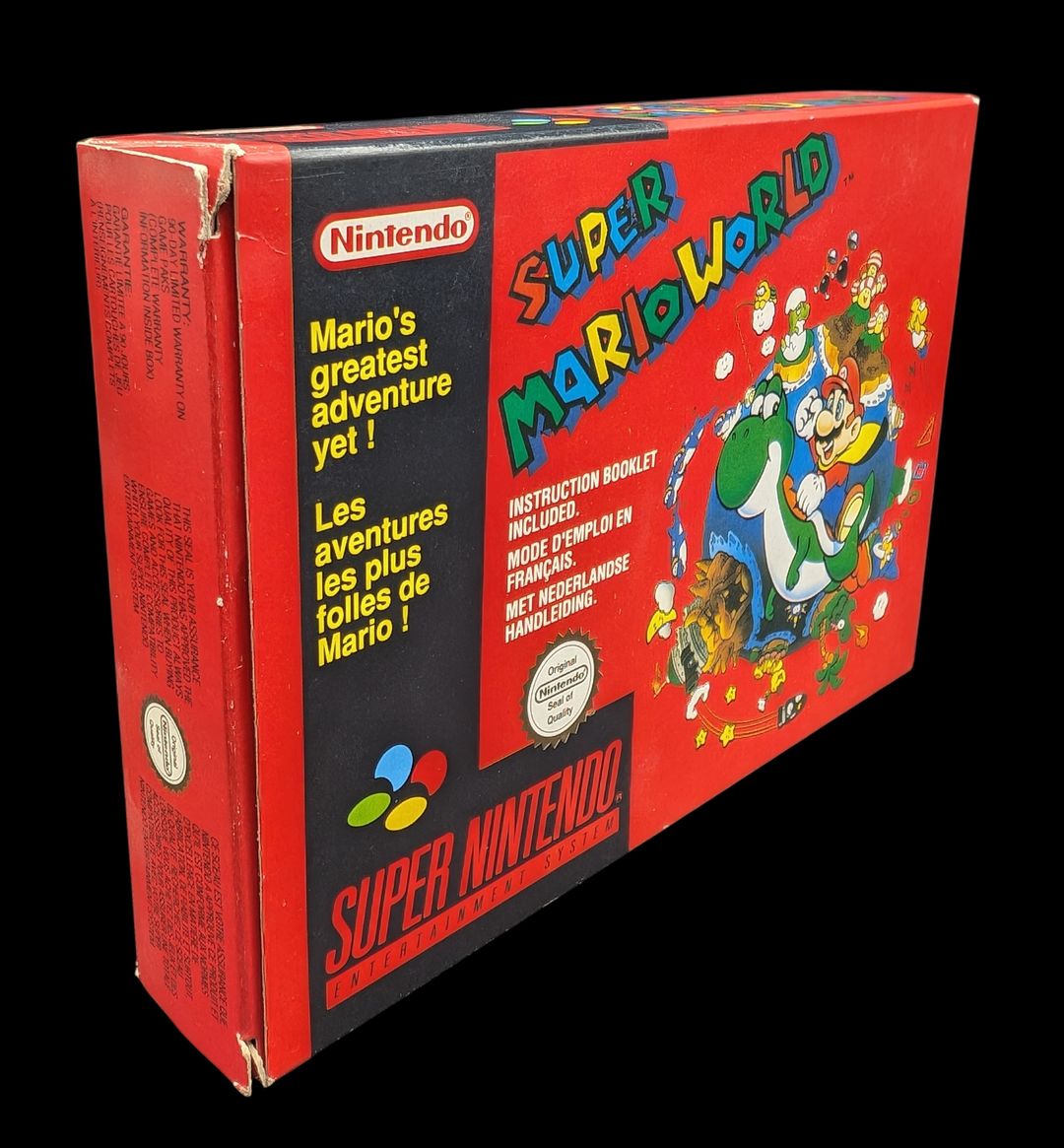 Nintendo - Super NES - Jeu Super Mario World. Avec boîte, notice, cale en plastique. Version du jeu FAH.