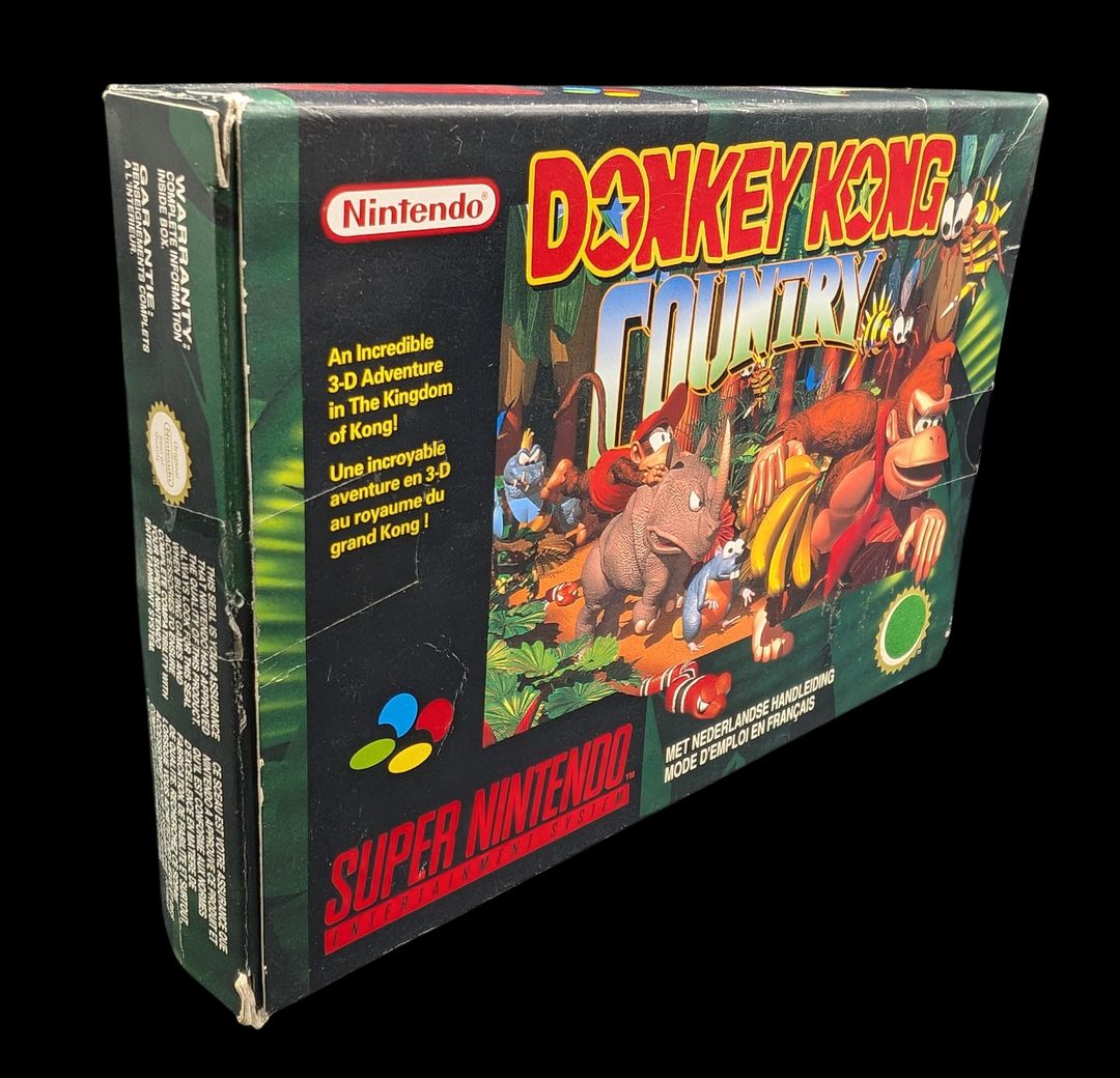 Nintendo - Super NES - Jeu Donkey Kong Country. Avec boîte, cale en carton. Version du jeu FAH.