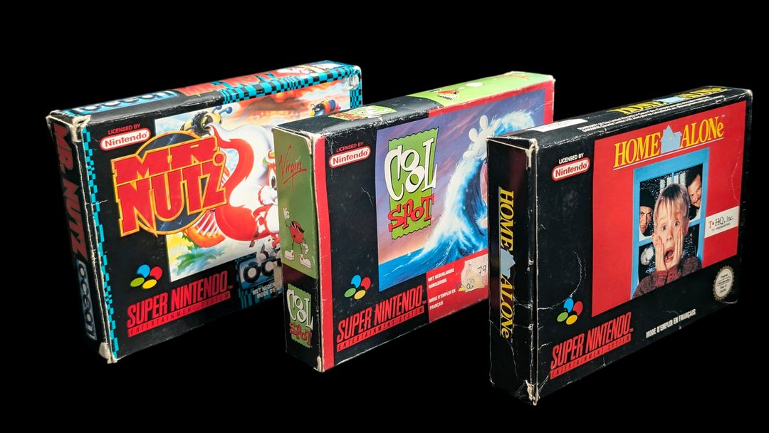 Nintendo – Super NES – Lot de 3 jeux : Cool spot, Mr Nutz, Home Alone. Avec 2 notices, cales en carton, boîtes.